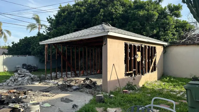 ADU and additions in Inglewood: stucco shell of the addition with its stud walls still open