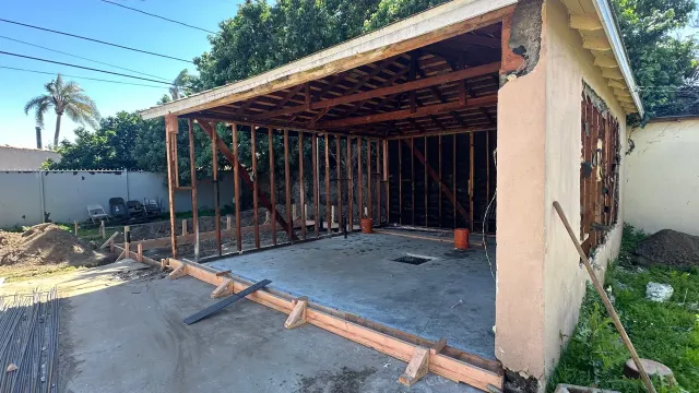 ADU and additions in Inglewood: open stud walls and roof framing of the addition