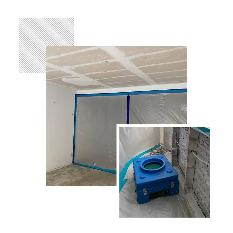 Plastic containment walls and an air scrubber set up inside a room during a remediation job